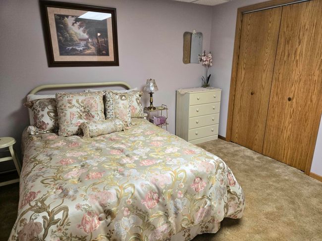 The basement bedroom has a window that was conforming when the house was built | Image 25