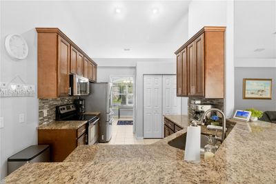 3205 Soft Breeze Circle, House other with 4 bedrooms, 3 bathrooms and null parking in Melbourne FL | Image 3