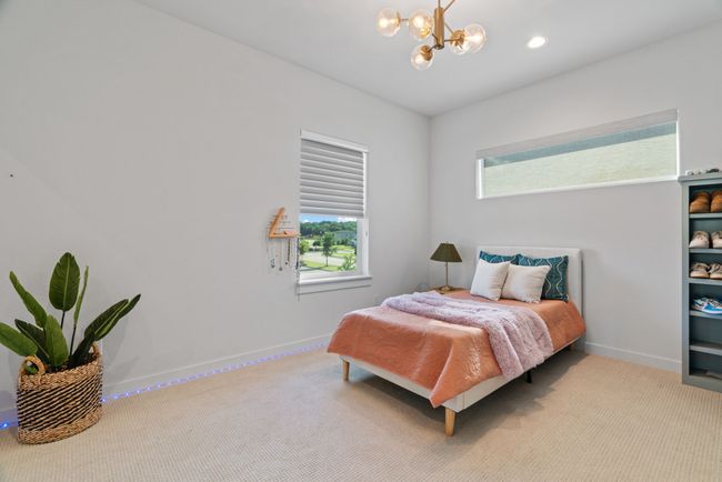 Bedroom with carpet, a chandelier, and recessed lighting | Image 30