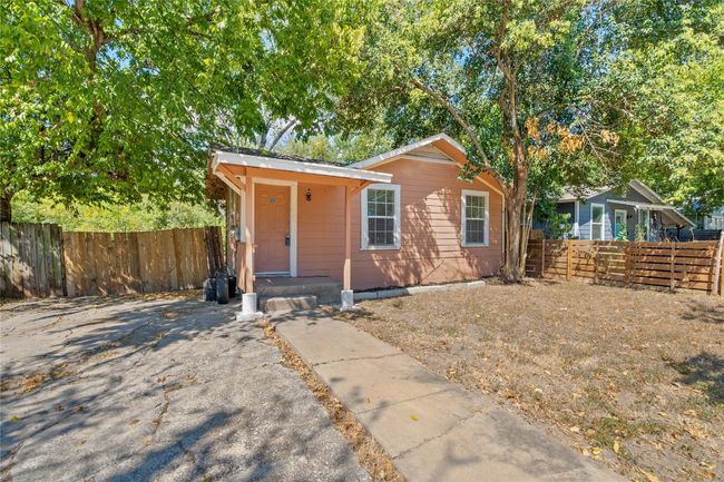 Parking area and covered front stoop for added convenience. | Image 4
