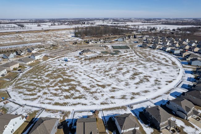 snowy aerial view featuring a residential view | Image 51