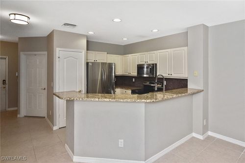 8681 Athena Ct, LEHIGH ACRES, FL, 33971-3753 | Card Image