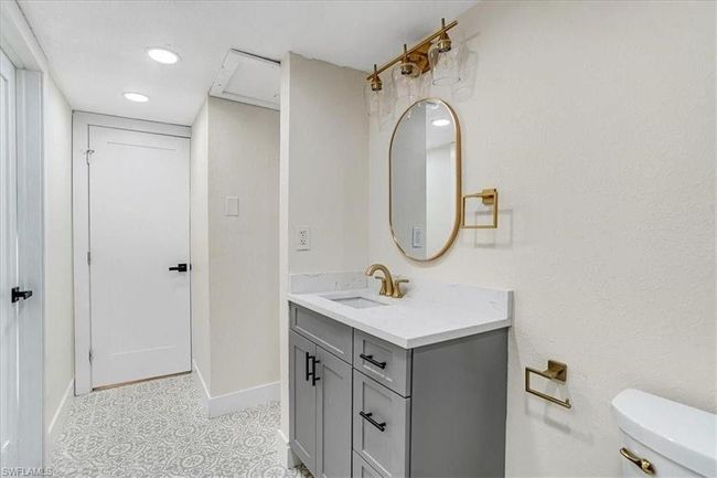 Bathroom featuring vanity, recessed lighting, and tile patterned floors- Virtually edited | Image 22