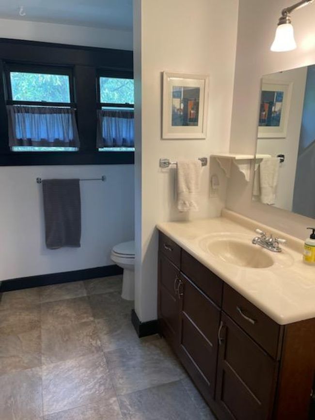 The 3rd bedroom has a built in dresser and twin bed. | Image 21