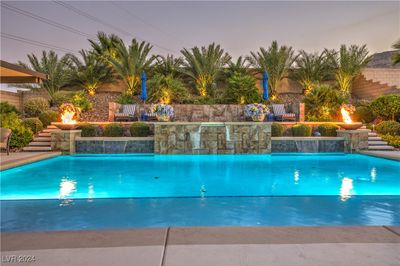 This property boasts a rare 894-square-foot pool, a feature that can no longer be built in Las Vegas due to current regulations! SOLAR PANELS, will be PAID OFF AT COE. | Image 1