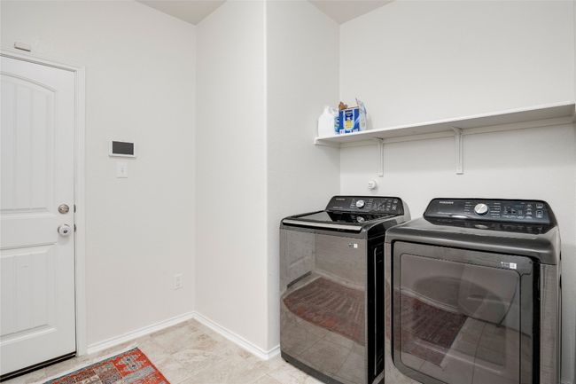 Washroom with independent washer and dryer and baseboards | Image 24