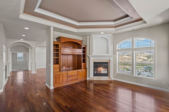 Family room with fireplace | Image 12