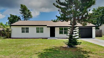 1375 Nolan Street Ne, House other with 3 bedrooms, 2 bathrooms and null parking in Palm Bay FL | Image 1