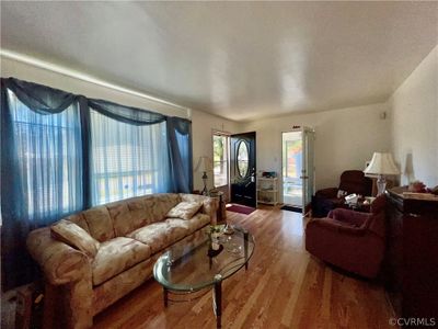 Living room featuring hardwood / wood-style floors | Image 3