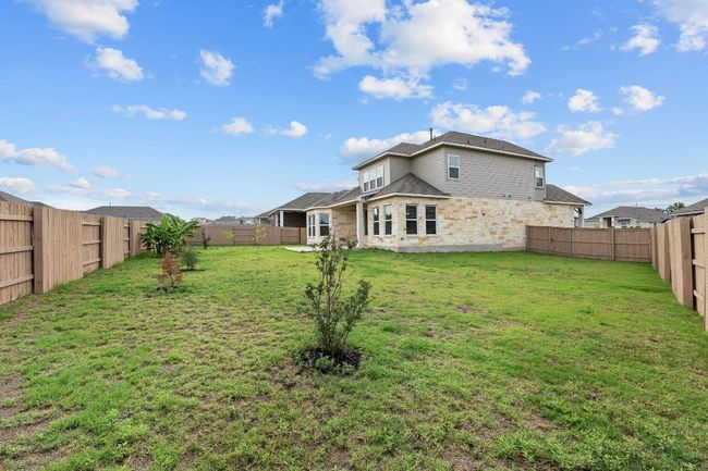 Rear view of property with stone siding | Image 36