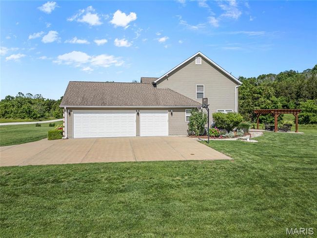 3 car garage w 8' high doors | Image 35