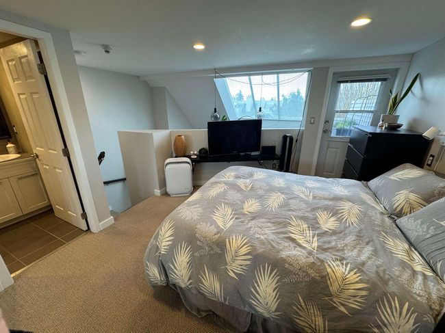 Tiled bedroom with recessed lighting, carpet, and access to exterior | Image 14