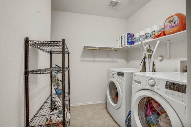 Laundry room with plenty of storage | Image 30