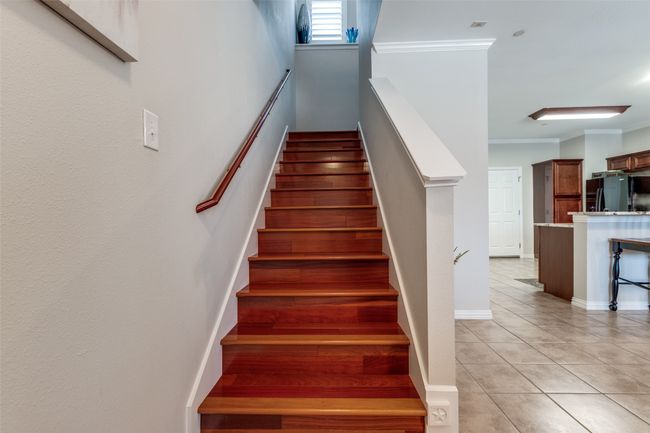 Stairway with beautiful hardwood flooring | Image 8