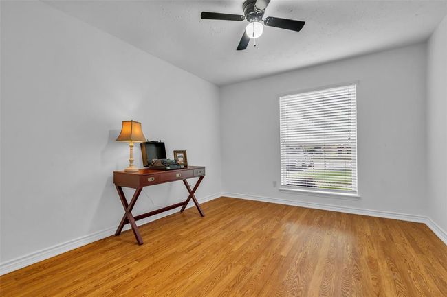 Bedroom no. 4 makes a beautiful study with plenty of natural light. | Image 29