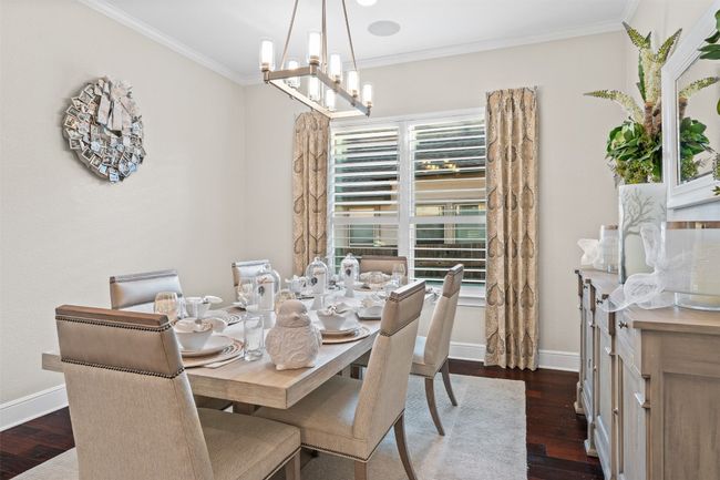 Anchored by gracious windows that invite in natural light, the space feels airy and welcoming. | Image 10