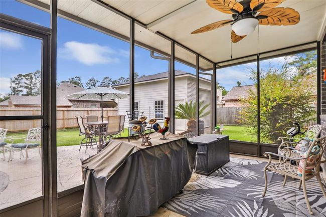 Beautiful screened in porch if you need to sneak away from the sun! | Image 9