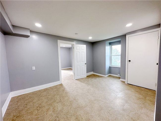 Unit 2 Bedroom is next to the living room | Image 6