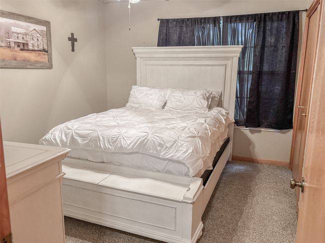 Bedroom featuring carpet floors | Image 18