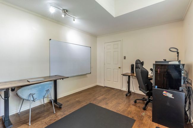 Home office featuring ornamental molding, wood finished floors, and baseboards | Image 28