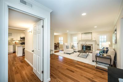 Enjoy the beautiful floors and wide baseboards | Image 3