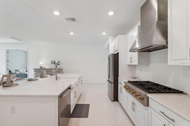 33466 Landsman Loop, House other with 4 bedrooms, 5 bathrooms and null parking in Wesley Chapel FL | Image 5