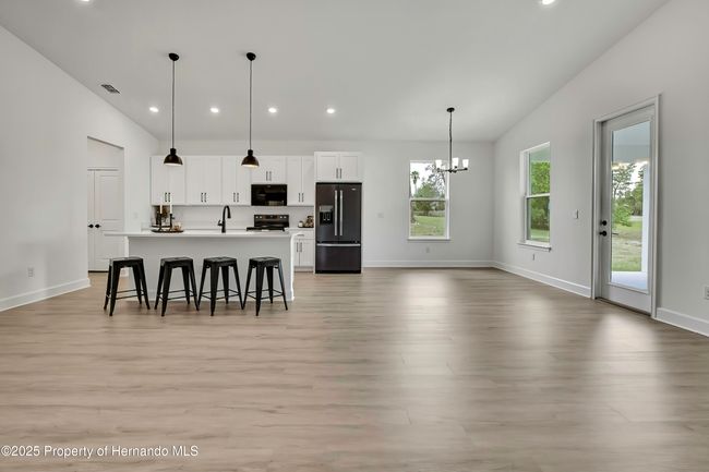 9739 Loretto St, House other with 4 bedrooms, 3 bathrooms and null parking in SPRING HILL FL | Image 4