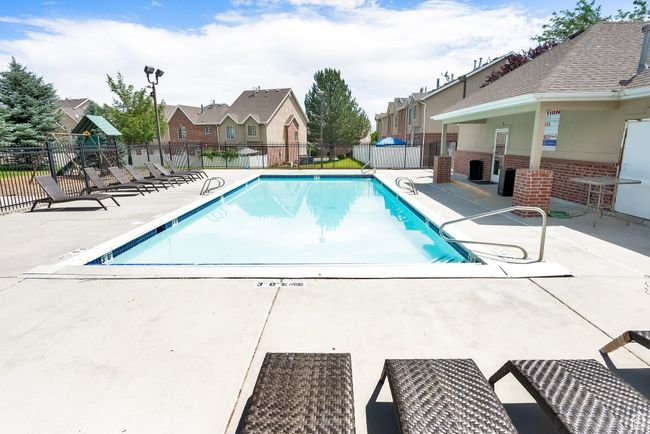 Community pool featuring a residential view and a patio | Image 33