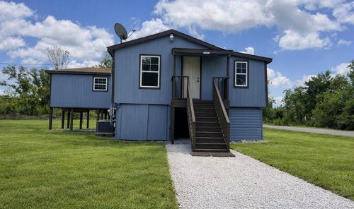 202 Snug Harbor Dr, Liverpool, TX, 77577-9763 | Card Image