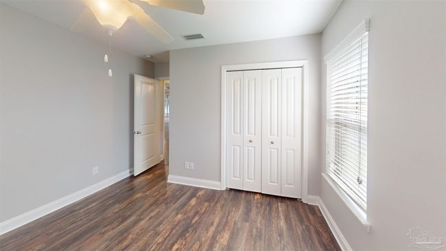 7445 Brevard St, House other with 4 bedrooms, 3 bathrooms and 6 parking in Navarre FL | Image 15
