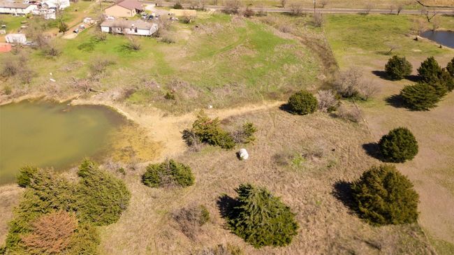 Aerial view featuring a water view | Image 9