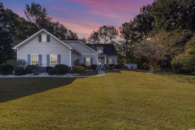 View of front of property with a yard | Image 1