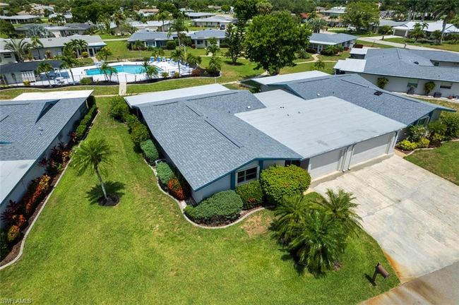Aerial view of residential area featuring a pool area | Image 5