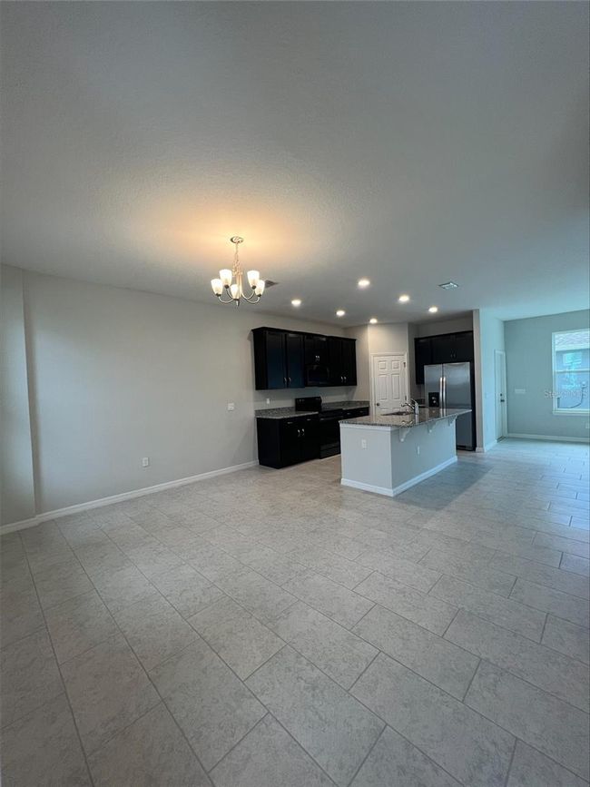 4989 Avalon Park Boulevard, Townhouse with 3 bedrooms, 2 bathrooms and null parking in Wesley Chapel FL | Image 7