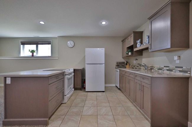 541 Aquitania Blvd W, House other with 6 bedrooms, 4 bathrooms and 4 parking in Lethbridge AB | Image 39