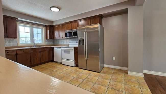 3 - 2614 11 Avenue, Townhouse with 3 bedrooms, 3 bathrooms and 2 parking in Wainwright AB | Image 8