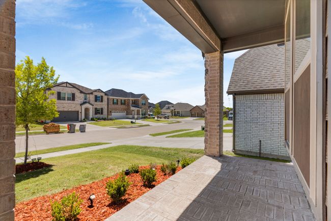 View of patio with a residential view | Image 6