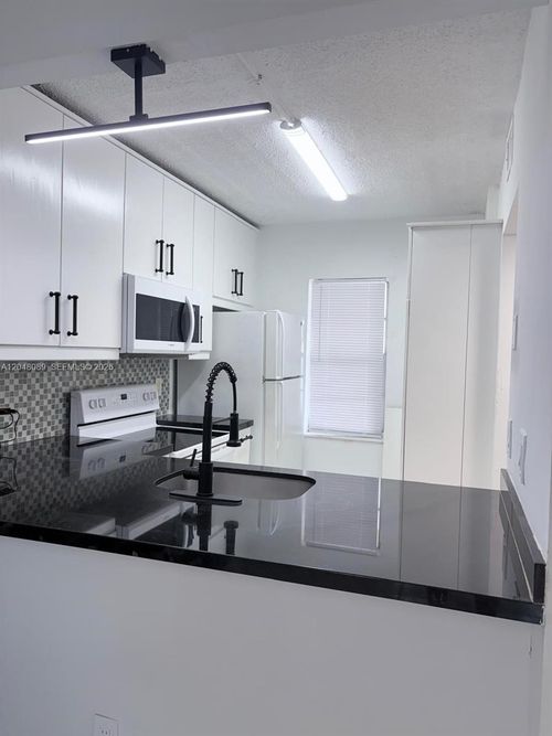 103-8305 Royal Palm Blvd, Coral Springs, FL, 33065-5710 | Card Image