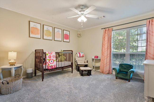 Another front bedroom with large window | Image 38