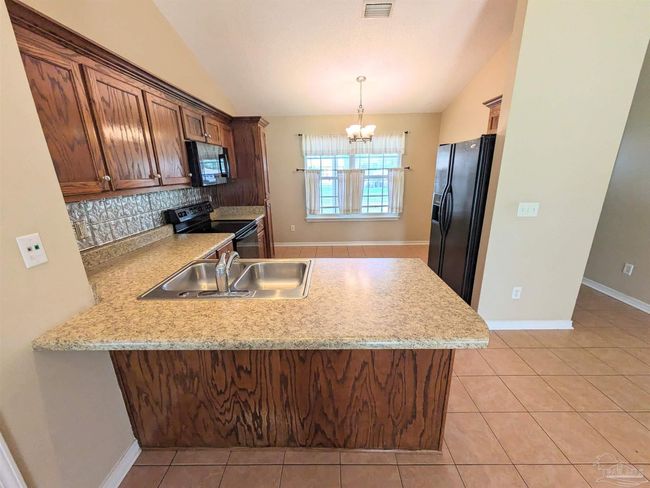 4920 Mayo Cir, House other with 3 bedrooms, 2 bathrooms and 1 parking in Pace FL | Image 11