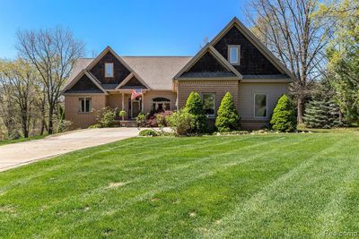 4483 Desert Bridge Court, Home with 4 bedrooms, 3 bathrooms and null parking in Highland Twp MI | Image 2