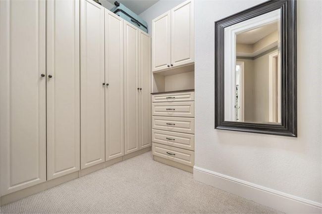 He has his own walk-in close as well. Both provide plenty of space for storage. | Image 25
