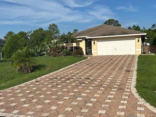 1407 Poinsettia Ave, Lehigh Acres, FL, 33972-8416 | Card Image