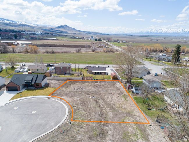 Lot 4 is larger than many of the other lots as it includes a retention basin that is part of the yard | Image 8