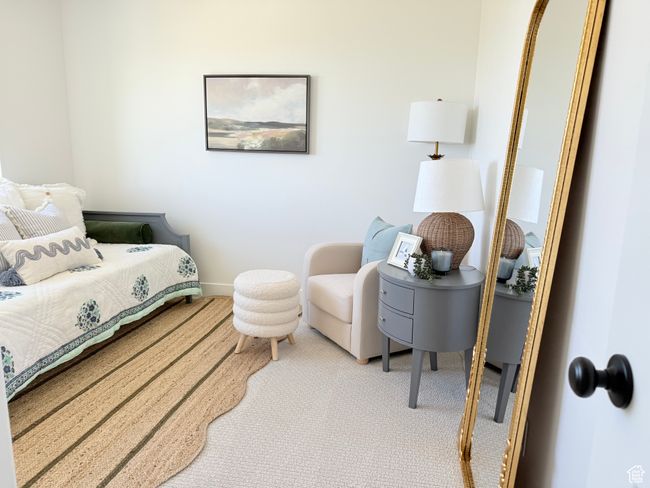 Carpeted bedroom featuring baseboards | Image 13