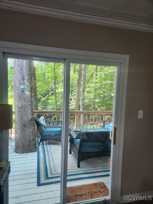 Doorway to outside featuring crown molding | Image 22