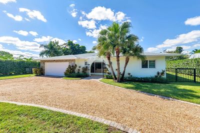 7711 W Lake Drive, House other with 4 bedrooms, 2 bathrooms and null parking in Lake Clarke Shores FL | Image 3