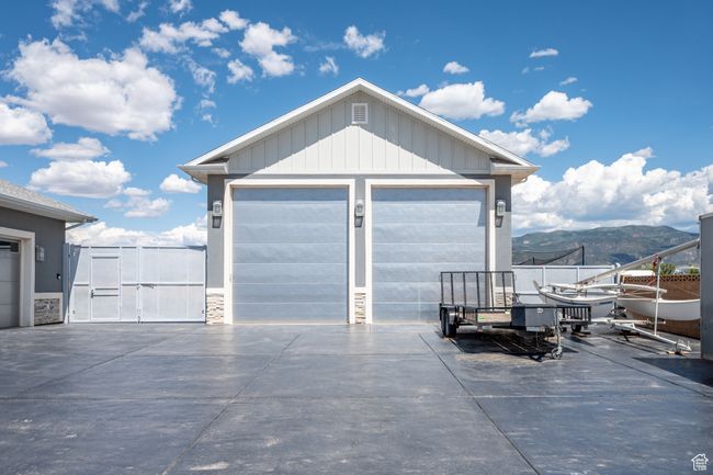 Detached garage featuring a mountain view | Image 105