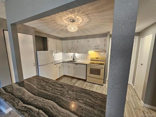 128-1302 S Parker Rd, Denver, CO, 80231-2133 | Card Image