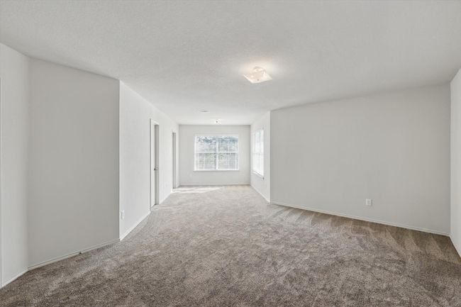 Empty room with carpet floors and baseboards | Image 21